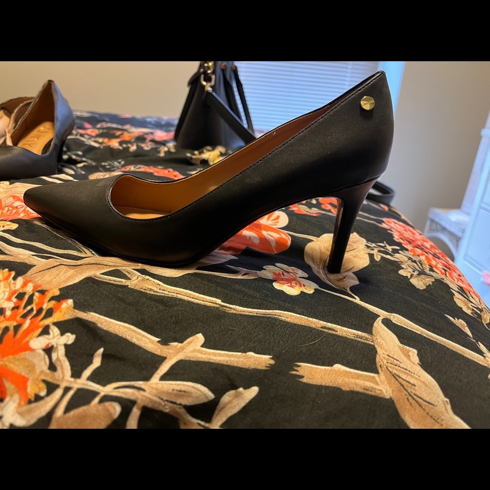 Never worn heels, Calvin Klein